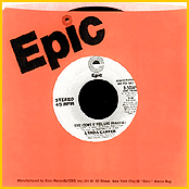 "Toto (Don't It Feel Like Paradise)". Double A-side promotional single.